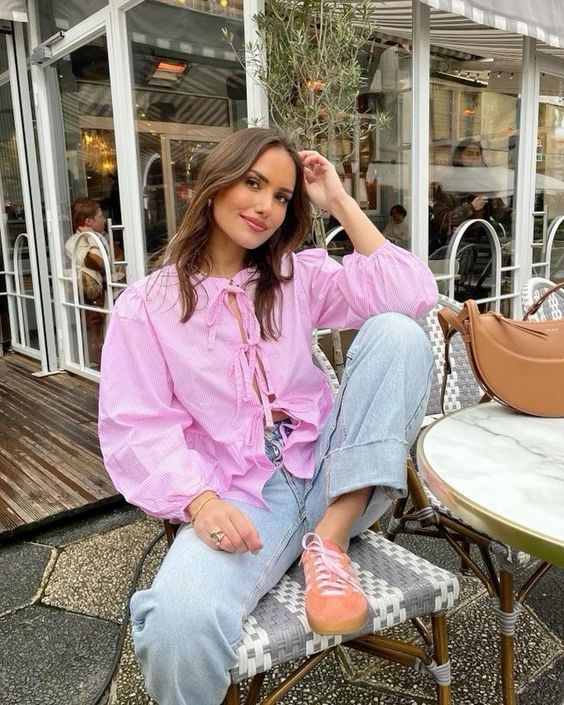 Pink Blouse with Blue Jeans and Sneakers